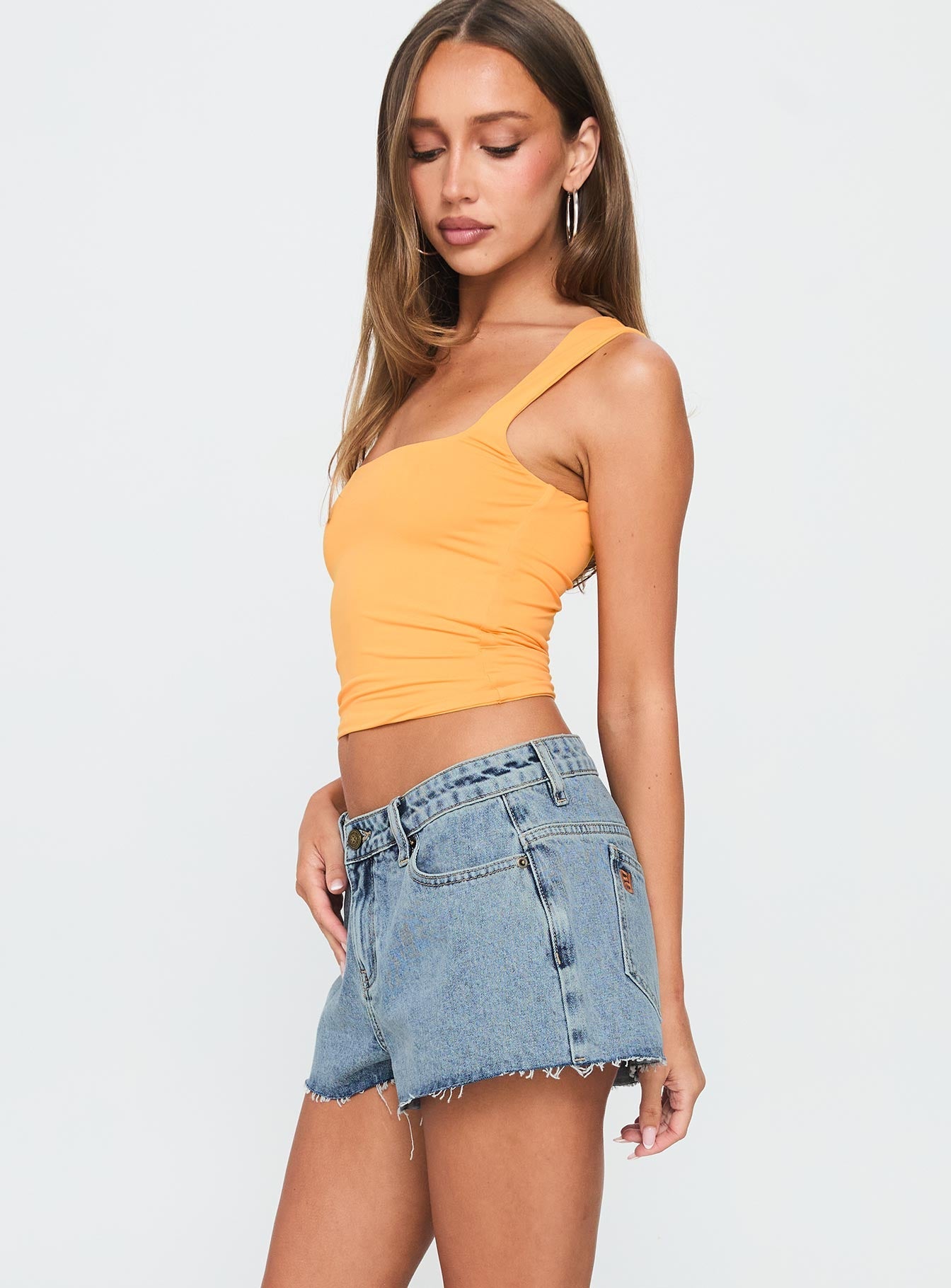 Tilted Denim Mini Short Mid Wash